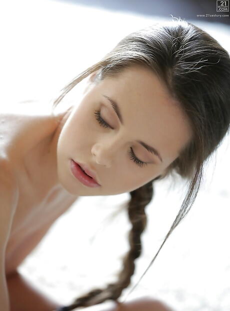 Sylphlike ukrainian pornstar Abrill Gerald uncovering small tits and masturbating 